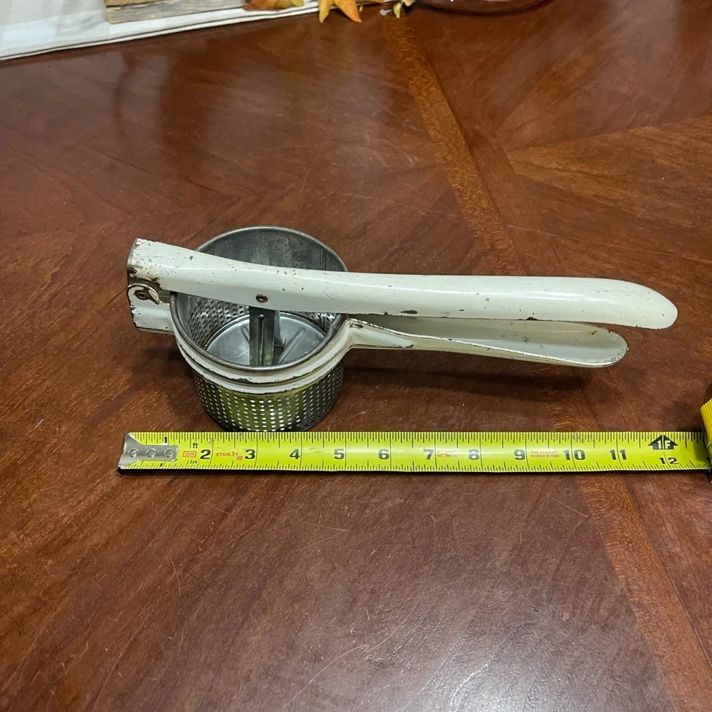 Vintage Handy  potato masher ricer.
